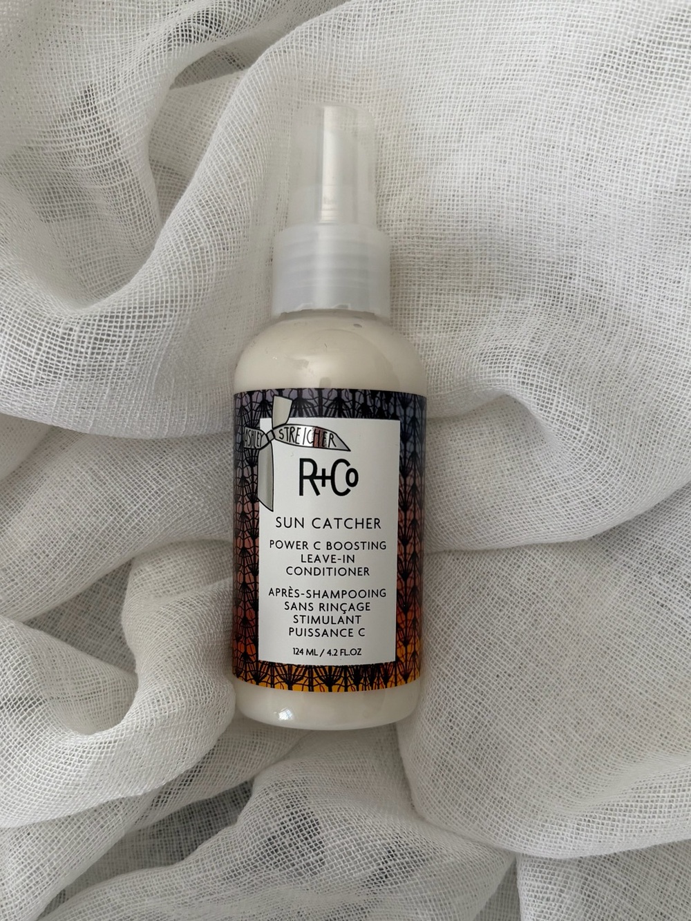 R+Co Sun Catcher Leave-In Conditioner — White & Black Label Accents